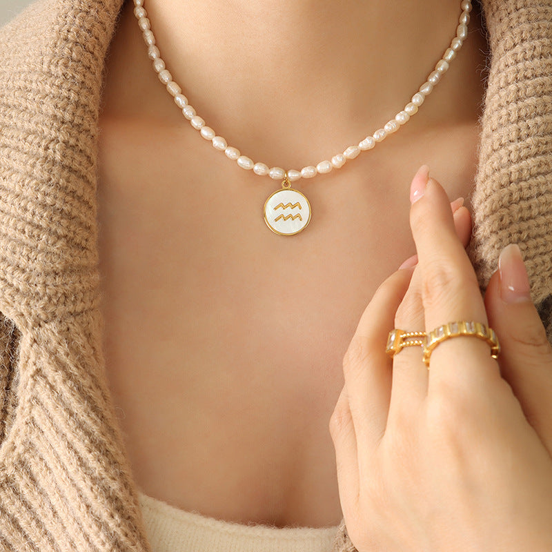 18K gold noble and fashionable pearl strand with round inlaid gemstone twelve constellation design necklace