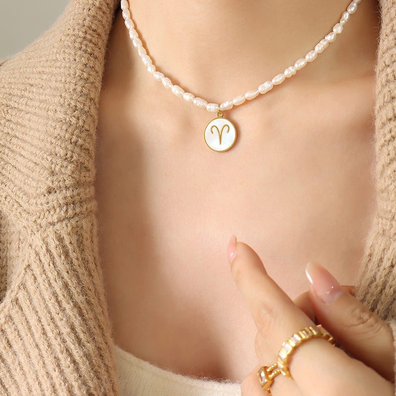 18K gold noble and fashionable pearl strand with round inlaid gemstone twelve constellation design necklace