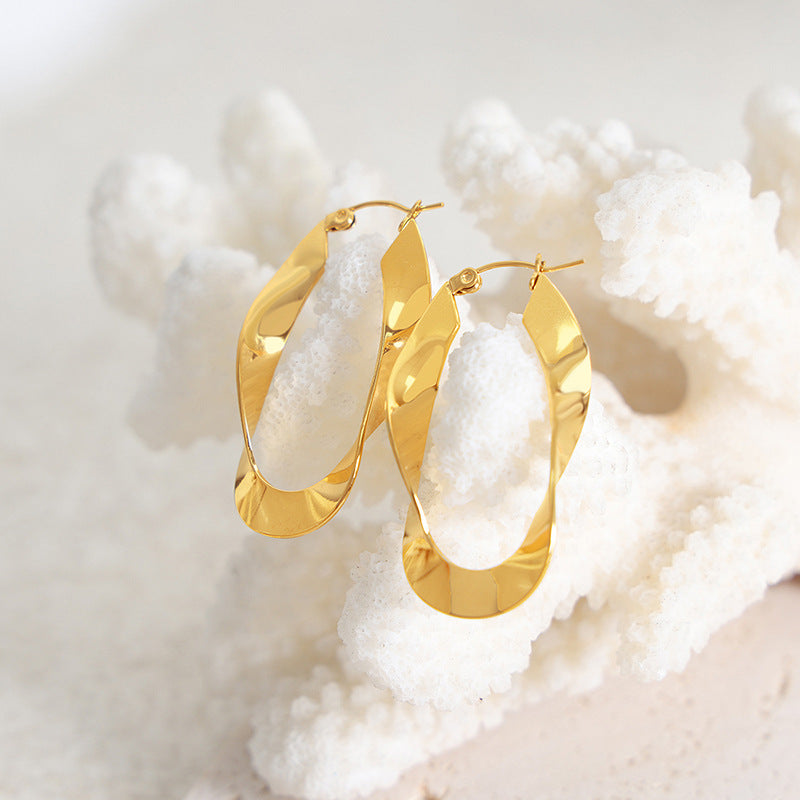 18K gold trendy exaggerated U-shaped twisted design simple wind earrings