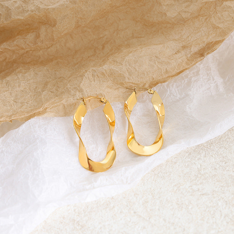 18K gold trendy exaggerated U-shaped twisted design simple wind earrings