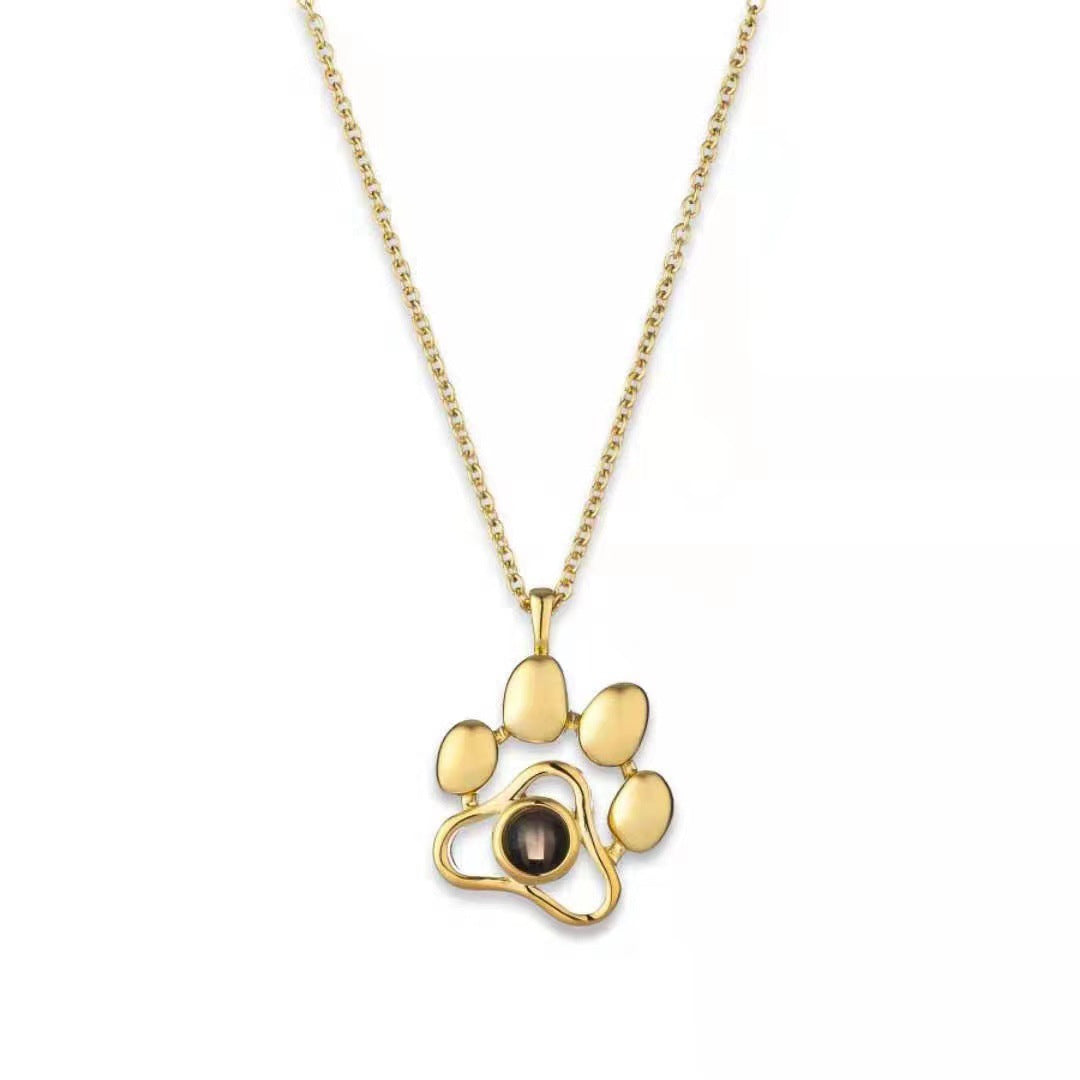 Trendy and fashionable dog paw print projection necklace