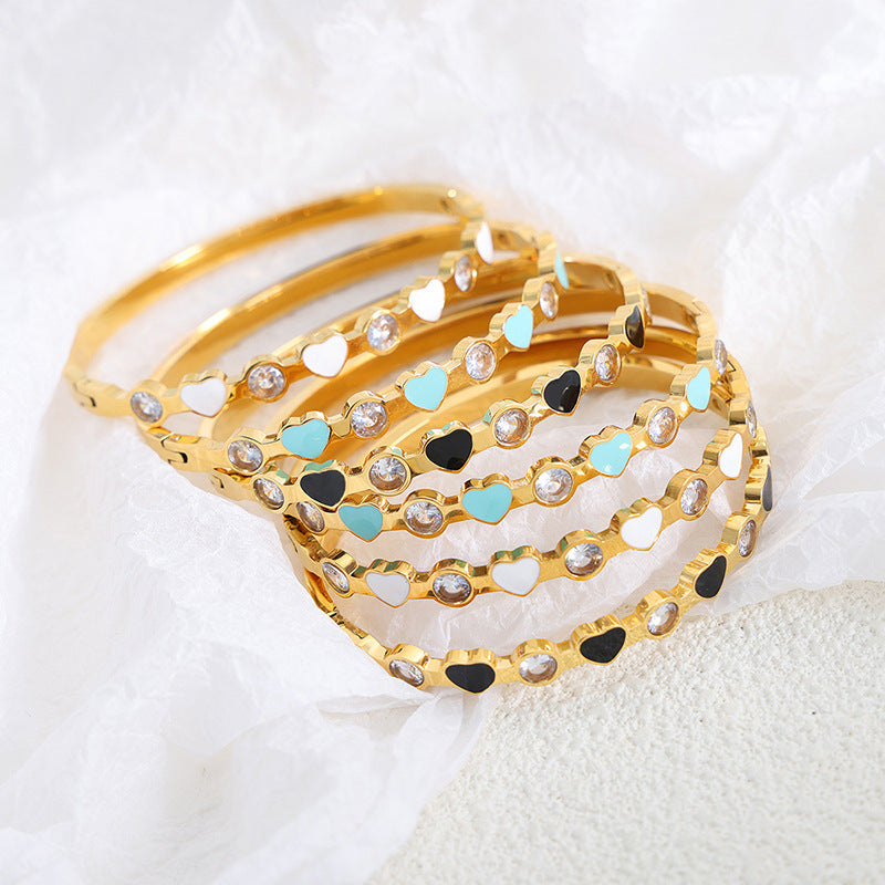 18K gold classic fashionable heart-shaped stitching round zircon design bracelet